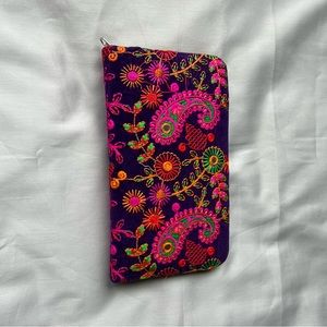 Wallet handmade in Pakistan. Purple with multicolored design
